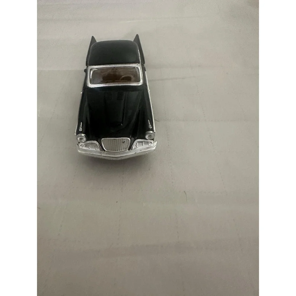 Toy Metal Die Cast 1958 Studebaker Golden Hawk Road Signature Car Black Gold
